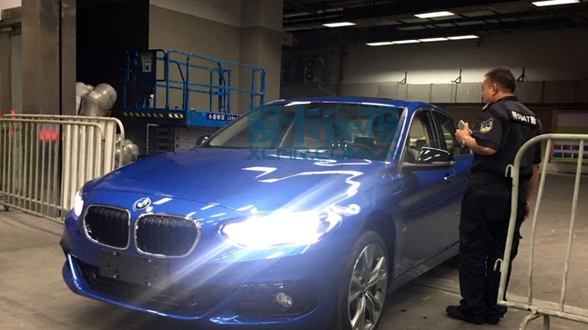 China made BMW 1 Series sedan blue front photographed