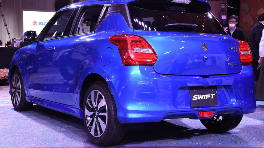 2017 Suzuki Swift blue rear three quarters left side launch event